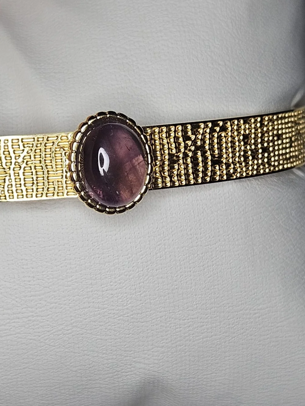 Gold Tone Stainless Steel Open Cuff Bracelet with Purple Gemstone Center